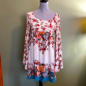 Free People Dress with Warm Floral Print, Long Bell Sleeves, and Upper Back Tie